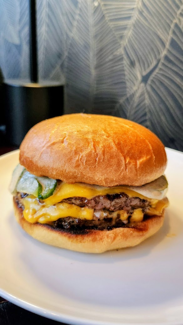 Birch burger with smoked onion aioli and house pickles