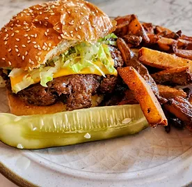 Uncle Wolfie's Big McAllister burger